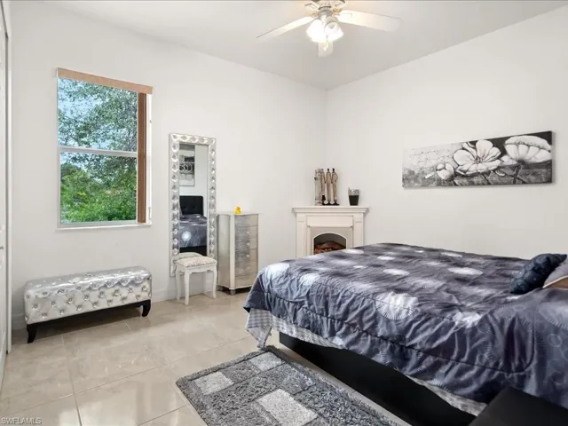 Bedroom featuring a ceiling fan