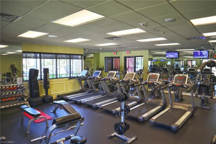 Exercise room with a paneled ceiling