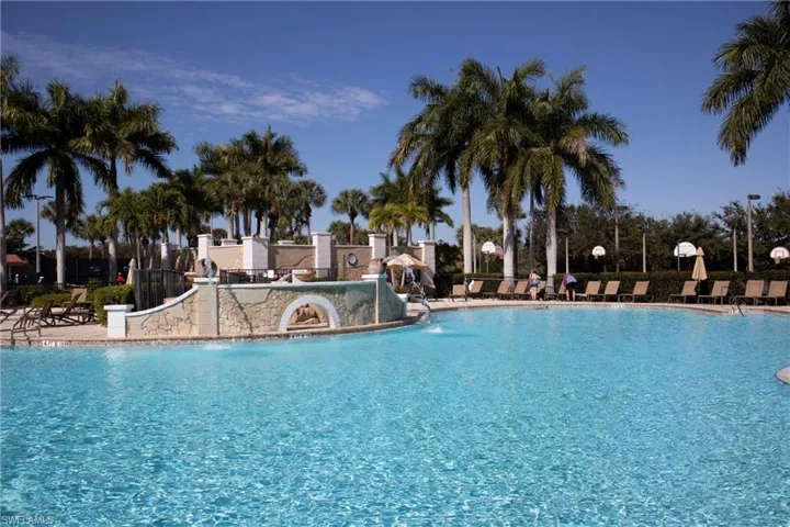 View of swimming pool featuring pool water feature