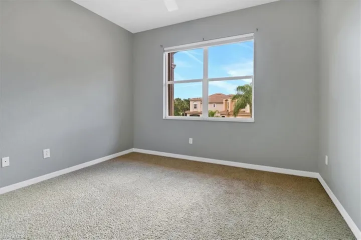 Spare room featuring carpet floors