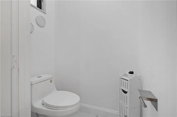 White toilet with a round seat