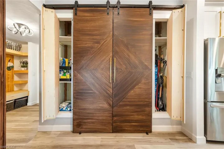 Hidden storage behind bookcases of pantry