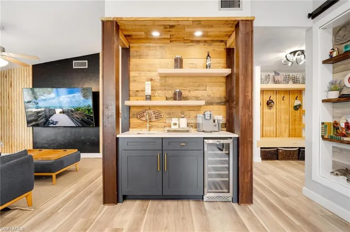 Gorgeous bar for coffee or cocktails with sink and refrigerator