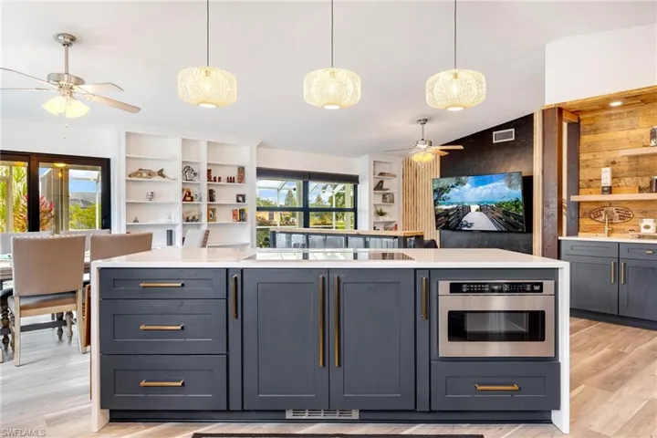 Microwave drawer and induction cooktop