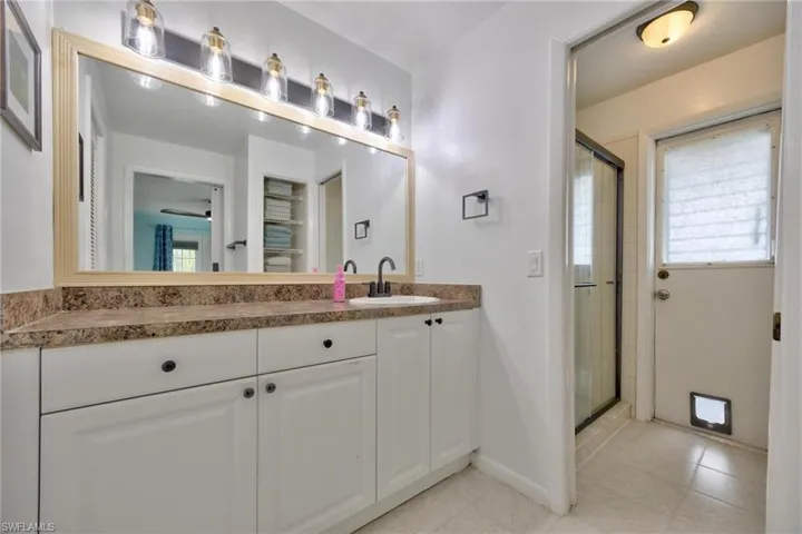 Primary Bath with Door to Pool