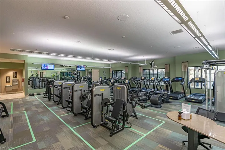 Workout area featuring a textured ceiling