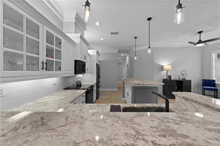Kitchen featuring beautiful level 3 granite counters
