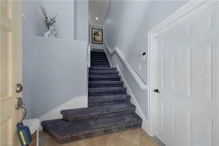 Stairs featuring brand new plush carpeting.