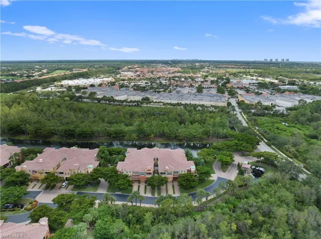 Your new home is just a short walk to Coconut Point Mall