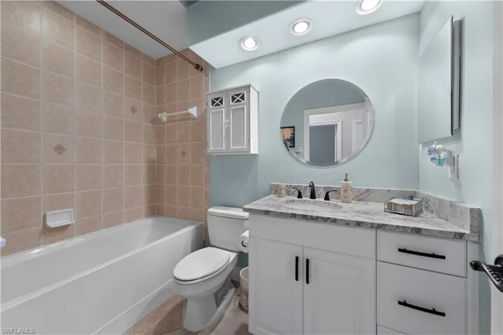Full guest bathroom shower/tub combo.