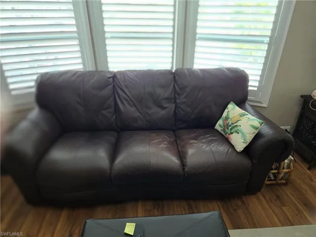 Living room with hardwood / wood-style floors