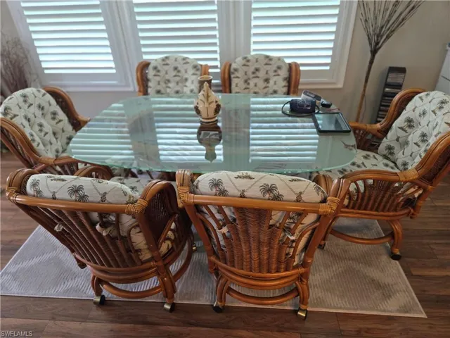 Dining room with hardwood / wood-style flooring