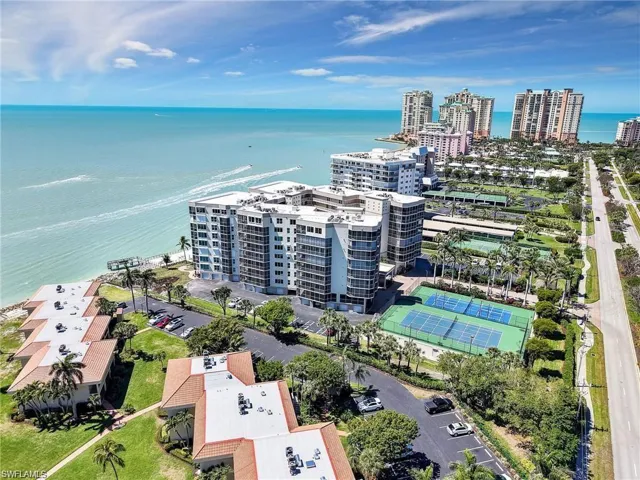 View of urban area featuring a nearby body of water and apartment complex