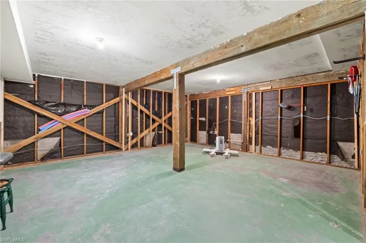 Misc room with unfinished concrete flooring