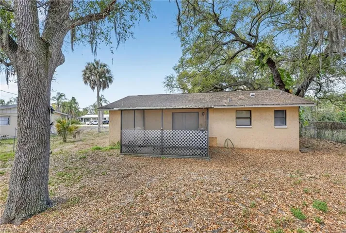 Back of property with stucco siding