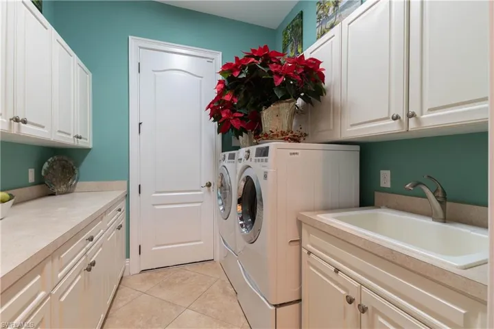 Laundry room with sink and extra storage