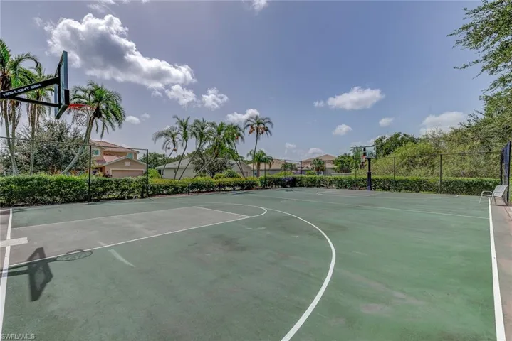 View of sport court with fence and community basketball court