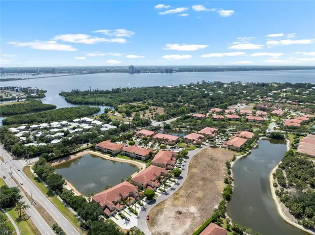 Bird's eye view featuring a water view and a residential view