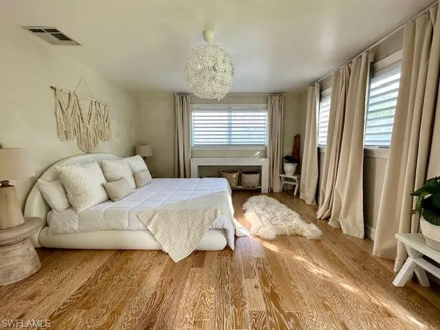 Master Bedroom featuring wood finished floors