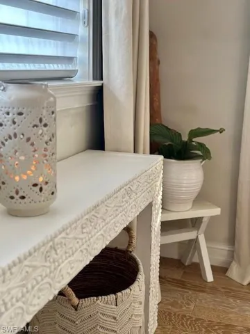 Detailed view of wood finished floors and baseboards