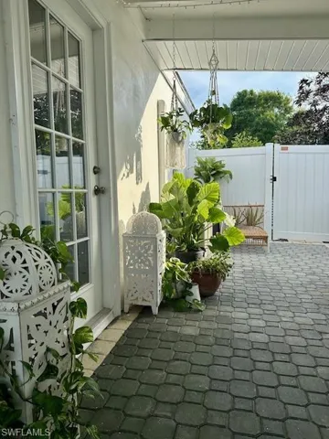 View of car port which doubles as a patio