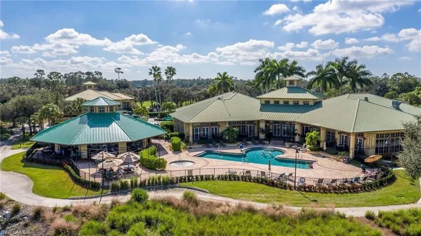 Community pool with a patio area