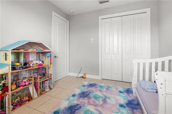Playroom featuring light tile patterned floors