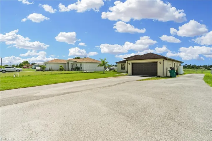 Garage with a lawn