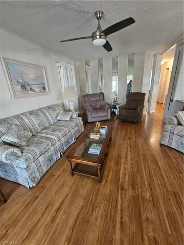 Living room with beautiful wood finished floors
