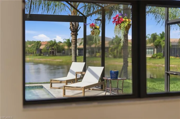Screened lanai with direct pool access and water frontage