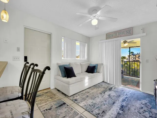 21602 Tiled living room featuring a textured ceiling