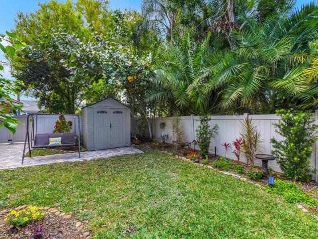 Detached Shed with New Pavers, Offers Extra Storage for Gardening Supplies