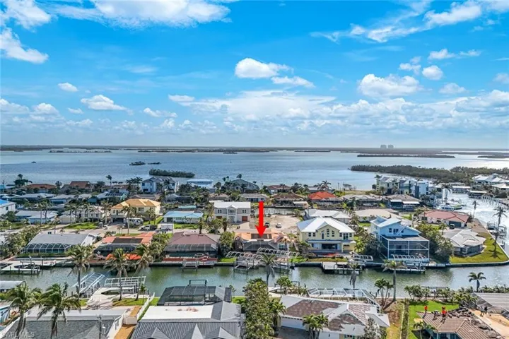 Aerial view with a water view and a residential view