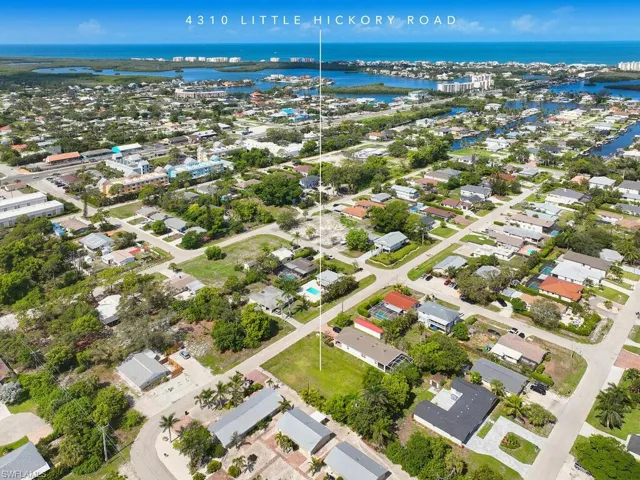 High aerial showing lot’s location near coast and river.