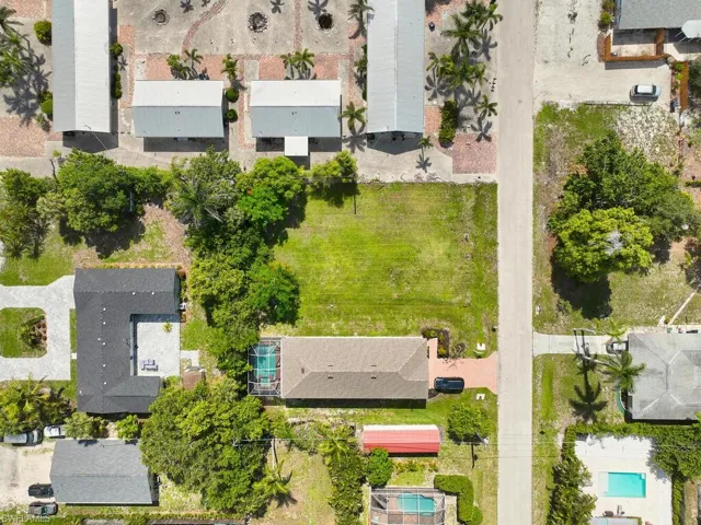 Direct overhead aerial of lot and surrounding homes.