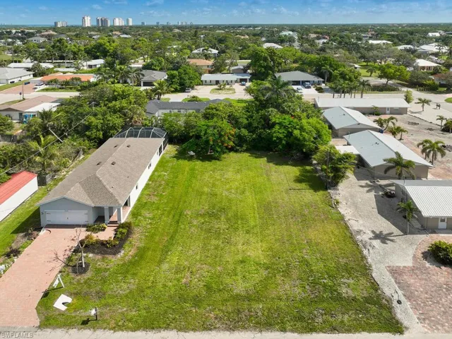 Detailed aerial view of the buildable residential lot.
