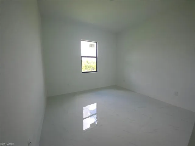 View of tiled spare room