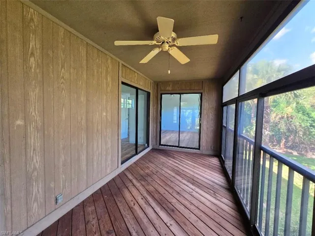 Screened Lanai w/Sliders to Great Room & Primary Bedroom View 1