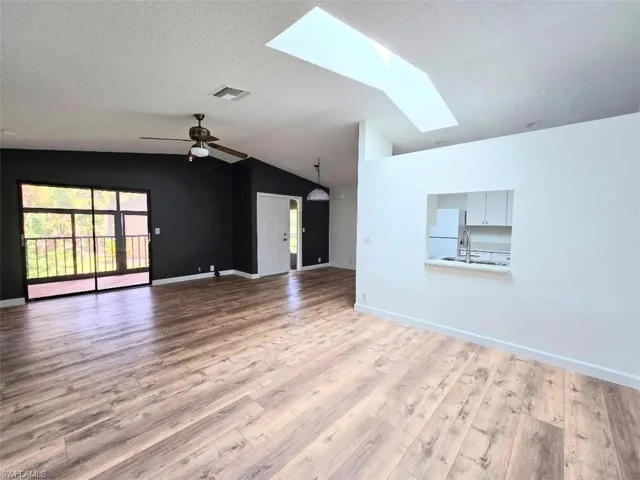 Great Room Facing Front Door w/Sliders to Lanai