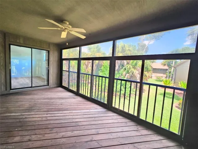 Screened Lanai w/Sliders to Primary Bedroom View 2