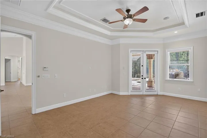 master bedroom and double doors to pool