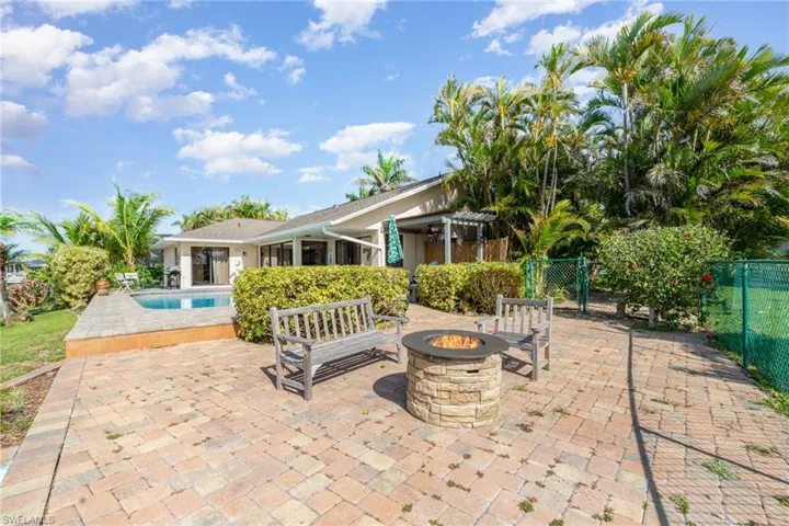 Patio / terrace with a gas fire pit that over looks the expansive water views.