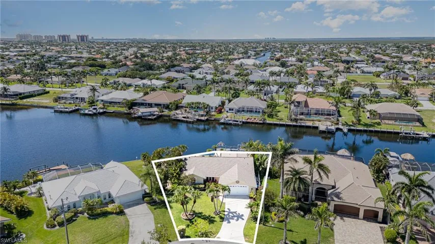 Aerial perspective showing approxiate lot lines indicated pie shaped waterfront parcel....offering 135' of water front
