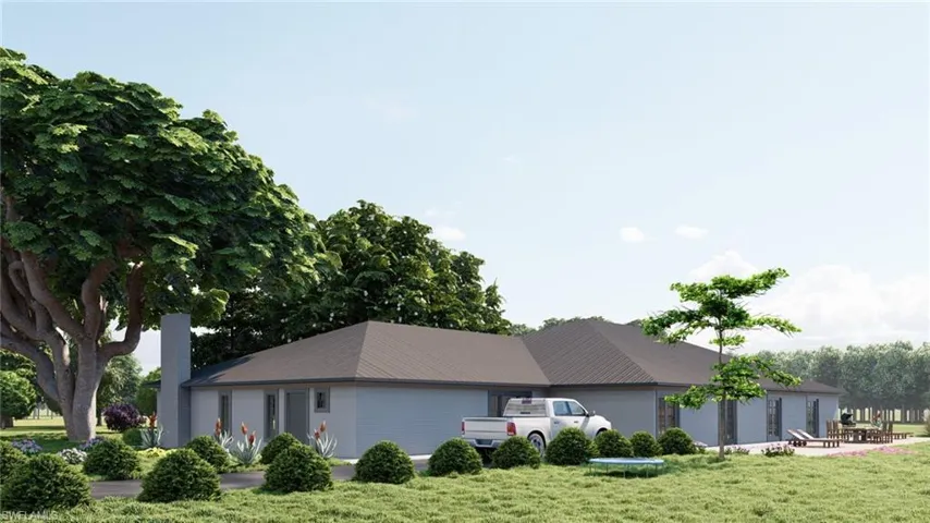 Rear view of property with a lawn - Conceptual Rendering