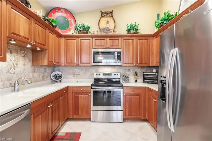 Kitchen adjacent to family room and breakfast nook