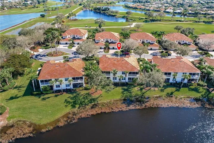 Aerial front back side of condo from Golf and lake area.