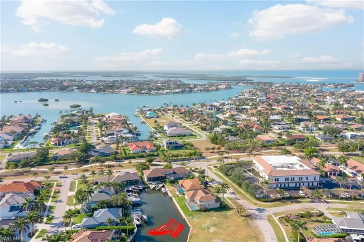 Bird's eye view with a water view and a residential view