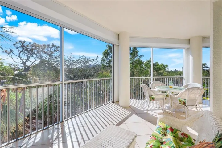 Expansive Lanai Views Over Mangroves & Palms