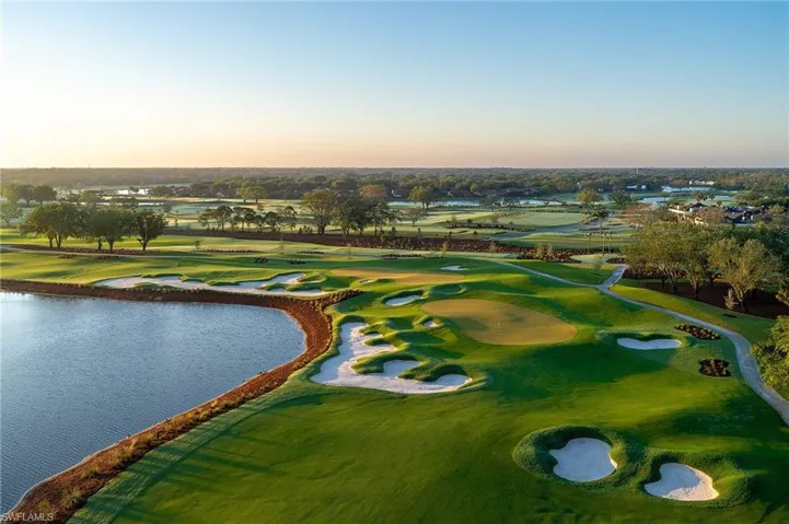 View of community featuring a water view and view of golf course