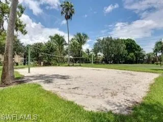 View of home's community featuring volleyball court